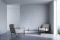 Concrete living room, armchairs