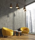 Concrete living room, yellow armchairs Royalty Free Stock Photo
