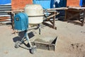 Concrete mixer, Concrete blender is a device that homogeneously combines cement, aggregate such as sand or gravel, and water to fo