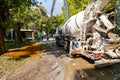 Concrete mixer at the construction site, pouring concrete from one mixer to other with pump for concrete