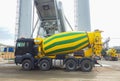 Concrete mixer truck in front of a concrete batching plant, cement factory Royalty Free Stock Photo