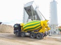 Concrete mixer truck in front of a concrete batching plant, cement factory Royalty Free Stock Photo