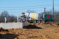 Concrete mixer truck pouring liquid concrete cement Royalty Free Stock Photo