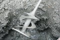Concrete mixing with electrical drill and mixer Royalty Free Stock Photo