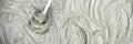 Concrete mixing with electrical drill and mixer. Panoramic banner cement mortar texture background Royalty Free Stock Photo