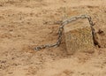 Concrete mooring block used to anchor watercraft