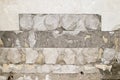 Concrete old wall with the remains of tiles and tile mortar. Background, texture.