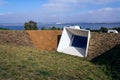 Concrete parts of Pavlov Archaeological park building on banks of Nove Mlyny water reservoir near Devicky castle ruins, South