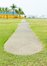 Concrete pathway and green grass at park Royalty Free Stock Photo