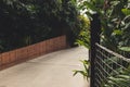 Concrete pathway in jungle forest with rope net Royalty Free Stock Photo