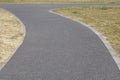 Concrete pathway and metal fence