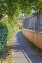 Concrete pathway outside the wall with fence at San Francisco, California