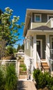 Concrete pathway to the entrance of brand new townhouse on sunny day in Canada. Royalty Free Stock Photo