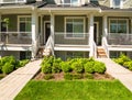 Concrete pathway to the entrance of brand new townhouse on sunny day in Canada. Royalty Free Stock Photo