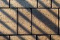 Concrete paving block stones with angular line shadows