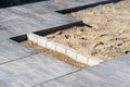 Concrete paving slabs on sand foundation base Royalty Free Stock Photo
