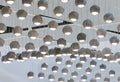 Concrete pendant lamp. Ceiling dotted with many concrete pendant lights.