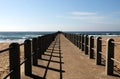 Concrete Pier Extending into Indian Ocean on Beach Royalty Free Stock Photo