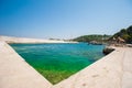 Concrete pier, vacationers dive into the pier