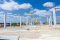 Concrete pillars of new edifice with a beautiful sky are placed Royalty Free Stock Photo