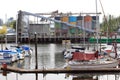 Concrete plant and sailing boats in downtown Vancouver, British Columbia, Canada.