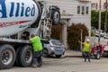 Workers with concrete plants in the street Royalty Free Stock Photo