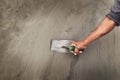 Concrete plasterers to create industrial workers background walls with plastering tools Royalty Free Stock Photo