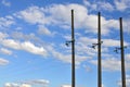 Concrete pole with wires of power line against the background of blue cloudy sk Royalty Free Stock Photo