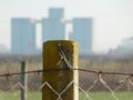 Concrete post industrial background barbed wire