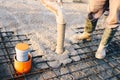 Concrete pouring during commercial concreting floors of building Royalty Free Stock Photo