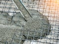 Concrete pouring during commercial concreting floors of buildings in construction site Royalty Free Stock Photo