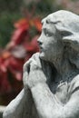 Concrete praying statue close-up Royalty Free Stock Photo