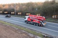 Concrete pump truck in motion on the british motorway M1