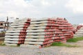 Concrete railway sleepers piled