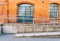 Concrete ramp way with stainless steel handrail Royalty Free Stock Photo