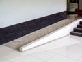 Concrete ramp way for support wheelchair disabled people inside the building Royalty Free Stock Photo