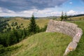 Concrete retaining wall build during World War One by Austro Hungarian Empire on a small forest road Royalty Free Stock Photo