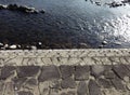 Concrete river bank along the Kuma River