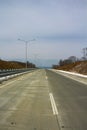 Concrete road runs beyond the horizon Royalty Free Stock Photo