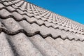 Concrete roof tiles with blue sky in background Royalty Free Stock Photo