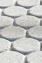 Concrete self locking flooring blocks in hexagonal in shape - used in construction industry to create permeable floors to rain