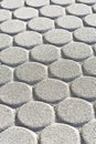 Concrete self locking flooring blocks in hexagonal in shape - used in construction industry to create permeable floors