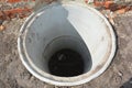 Concrete septic tank. Sewer tank hole installation outdoors Royalty Free Stock Photo