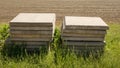 Concrete slabs on the field are stacked in two piles