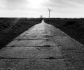 Concrete slabs road in northern Poland. Black and white dramatic high detail image.