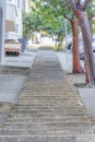 Concrete small steps on a sloped side walk in San Francisco, California