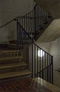 Concrete staircase with metal rails