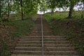 Concrete stairs going up to top of the hill Royalty Free Stock Photo