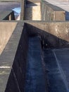 Concrete stairs on seawall in blackpool with the beach at low tide in sunlight Royalty Free Stock Photo