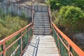 Concrete stairs to the bridge over the river Teshebs Royalty Free Stock Photo